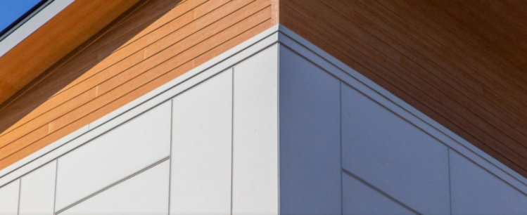 Close-up of Allura fiber cement siding on a multifamily residential building.