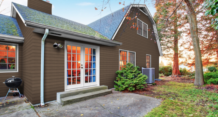 Extended Barndominium with Brown Lap Siding